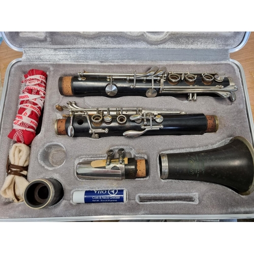 25 - A clarinet in carry case by LeFleur number 1039.