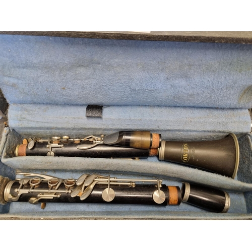 28 - A Clarinet with carry case (non matching parts).L 65 cm approx.