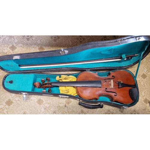 40 - A Violin with Bow in a carry case.