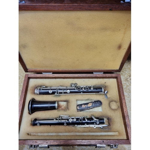 45 - An Oboe by Alfred Gray number 5259 with wooden carry case L 55 cm approx.