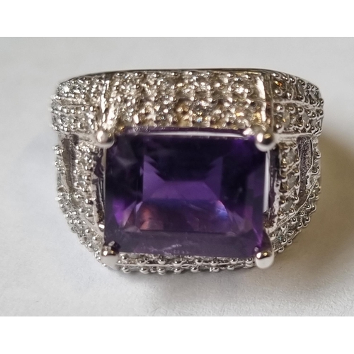 24 - A 14ct Gold, Diamond and Amethyst cluster Ring, stamped 14k size N.