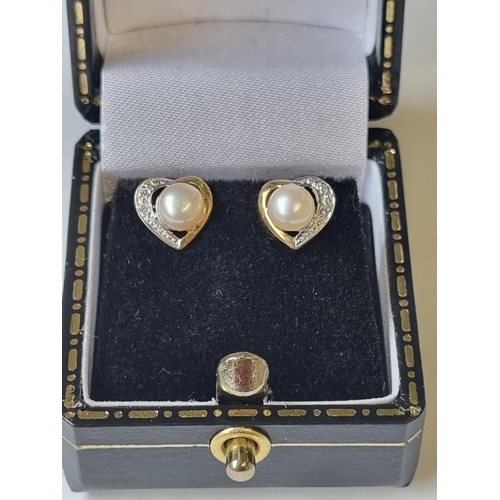 42 - A pair of Gold, Diamond and Pearl Earrings.