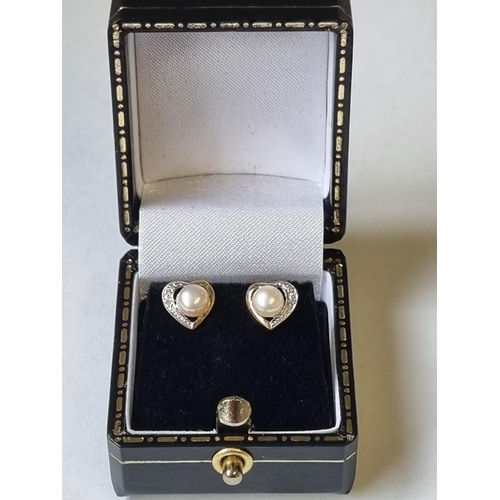 42 - A pair of Gold, Diamond and Pearl Earrings.
