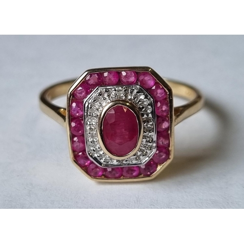 48 - A Diamond and Ruby Cluster Ring, size Q.