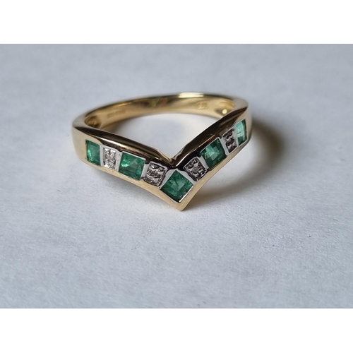56 - A Gold, Diamond and Emerald half eternity Ring., size N.