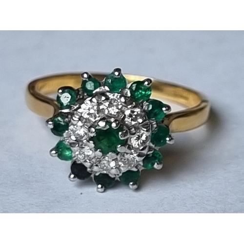 60 - An 18ct Gold, Diamond and Emerald cluster Ring, size P.