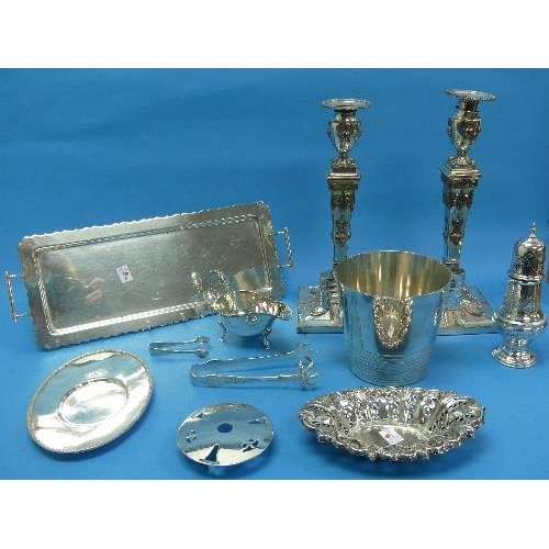 45 - A quantity of Silver Plate, including a pair of cast candlesticks, 12in (30cm) high, an ice bucket, ... 