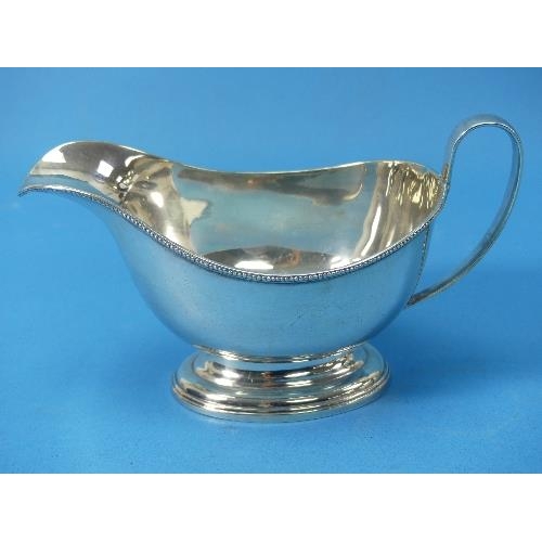 48 - A George V silver Sauce Boat, by Henry Clifford Davis, hallmarked Birmingham, 1919, of traditional f... 