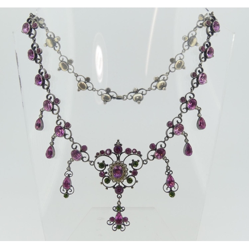 178 - A Palais Royale style paste Necklace, set with eight open scroll links each set two pink pastes and ... 