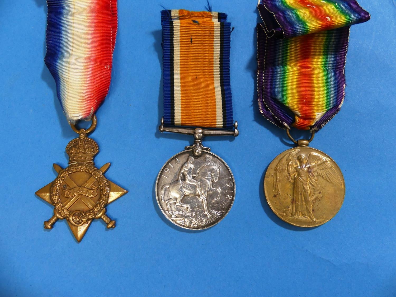 Three W.W.1 Campaign Medals; a 19141915 Star, named to 880 Dvr. E