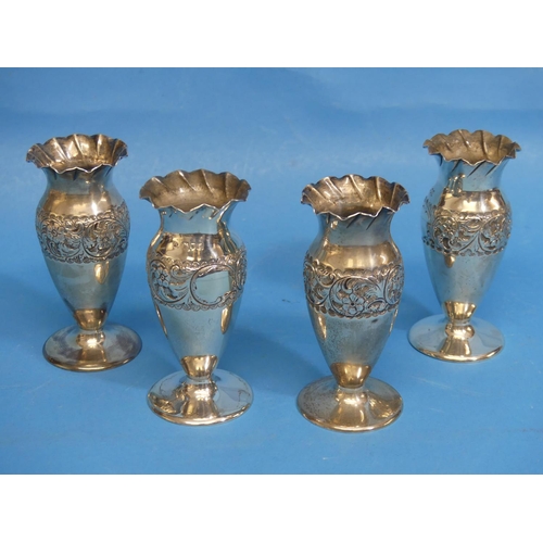 53 - A set of four Edwardian silver Vases, by Charles Edwards, hallmarked London, 1902, of baluster form ... 