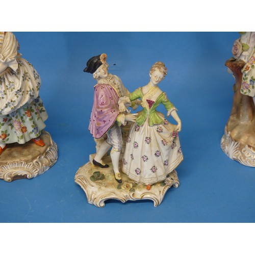 18 - A pair of 19thC Volkstedt-Rudolstadt porcelain Figural Candlesticks, with blue painted mark to base,... 