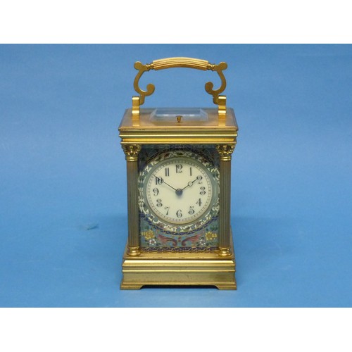 A late 19th century French enamel and gilt-brass striking Carriage Clock, with push button repeat, the five-glass case with circular dial, foliate enameled front panel and pilasters, the  eight-day two train movement striking the hours and half-hours on a coiled gong, 8in (20.25cm) high handle up, with carry case and key.