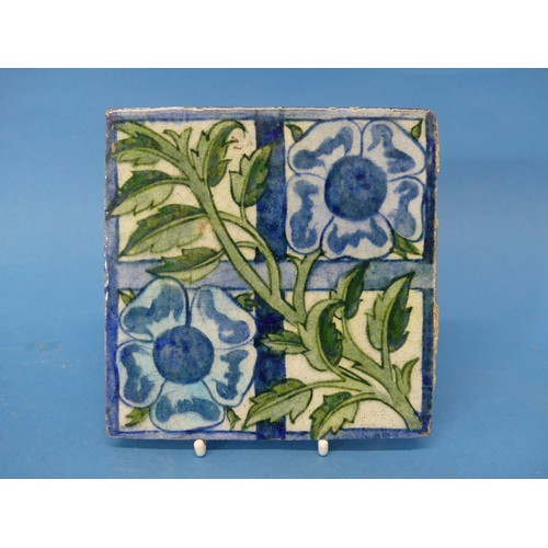 33 - A William de Morgan 'Rose Trellis' pattern Tile, the tile decorated with rose and trellis, in greens... 