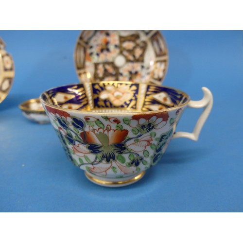 28 - A 19thC Royal Crown Derby 2451 pattern Tea Cup and Saucer, decorated in the typical imari palette,  ... 