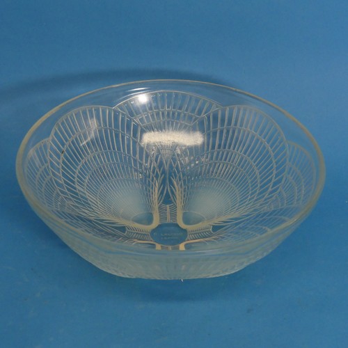 An early 20thC Lalique 'Coquilles' pattern Bowl, the glass bowl with moulded opalescent shell design, the bottoms of the four central shells forming feet, etched 'R LALIQUE FRANCE' and '2300' to base, 24cm diameter x 9cm high, possible restoration/ reshaping to rim.