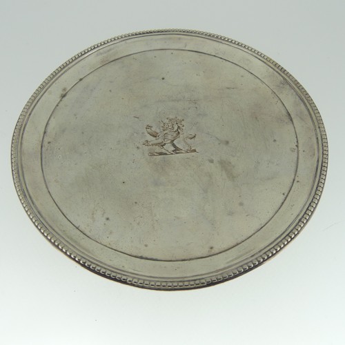 2 - A George III silver Waiter, by Elizabeth Jones, hallmarked London, 1784, of plain circular form with... 