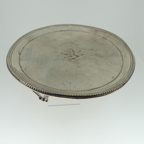 2 - A George III silver Waiter, by Elizabeth Jones, hallmarked London, 1784, of plain circular form with... 