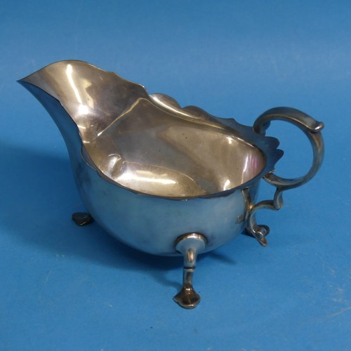 9 - A George V silver Sauce Boat, by Martin, Hall & Co., hallmarked Sheffield, 1912, of typical form... 