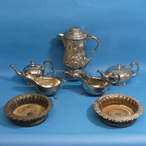 11 - A quantity of Silver Plate, including a large lidded tankard, two bottle coasters, teapots etc., (a ... 