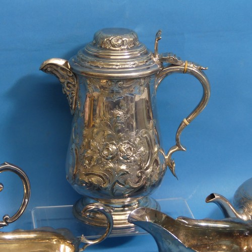 11 - A quantity of Silver Plate, including a large lidded tankard, two bottle coasters, teapots etc., (a ... 