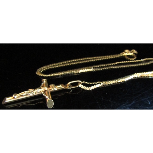 5024 - A gold cruxifix pendant on chain, stamped 9k, 51cm long, 5g