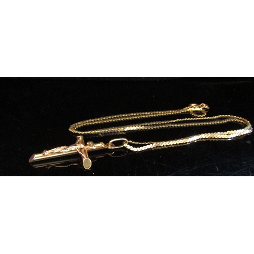 5024 - A gold cruxifix pendant on chain, stamped 9k, 51cm long, 5g