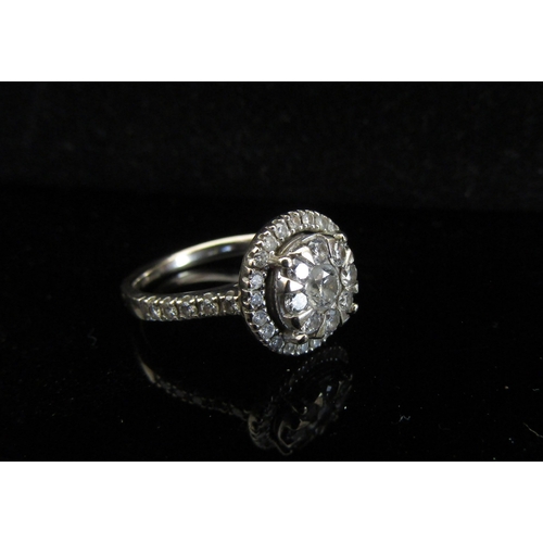 5049 - An 18ct white gold cluster ring, 1ct total. Size N, 4.3g with original receipt