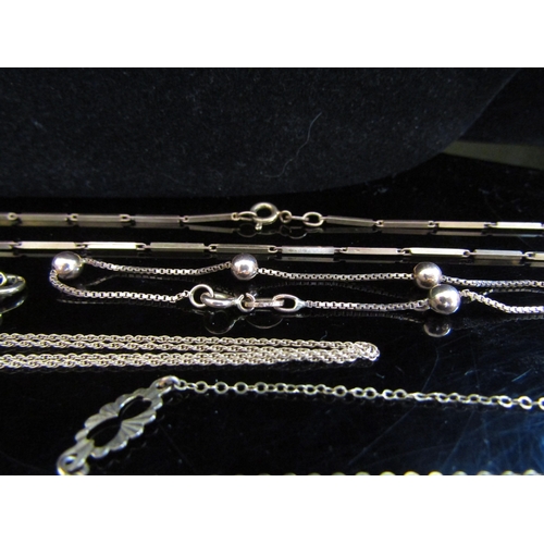 5052 - Three 9ct gold bracelets, two 9ct gold necklaces and another stamped 9k, 17.5g