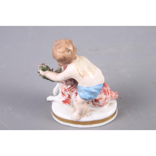 8 - An 18th century Derby bisque figure of a woman with a bird in a cage, 6