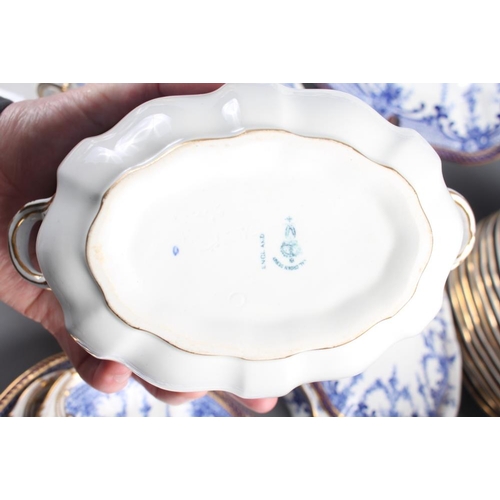 35 - A Royal Crown Derby blue and white part dinner service, decorated floral swags with gilt borders, ei... 