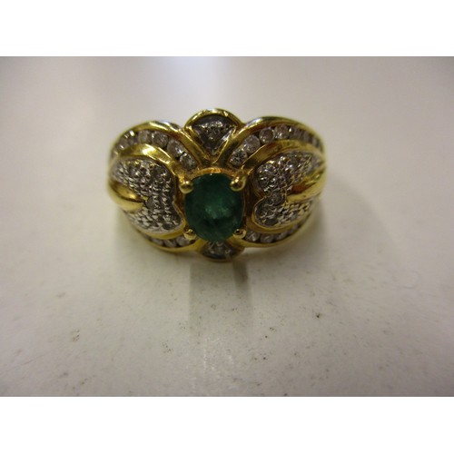 11 - An 18ct yellow gold diamond and gem set ring, approx. ring size ‘M’, in good pre-owned condition wit... 