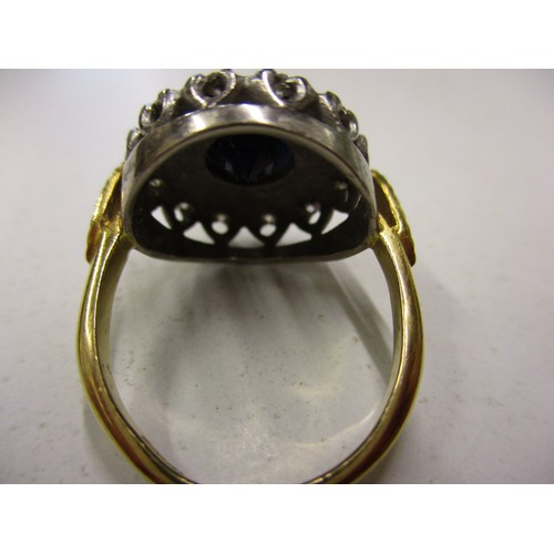 12 - An 18ct yellow gold diamond and sapphire? Ring, approx. ring size ‘M1/2’