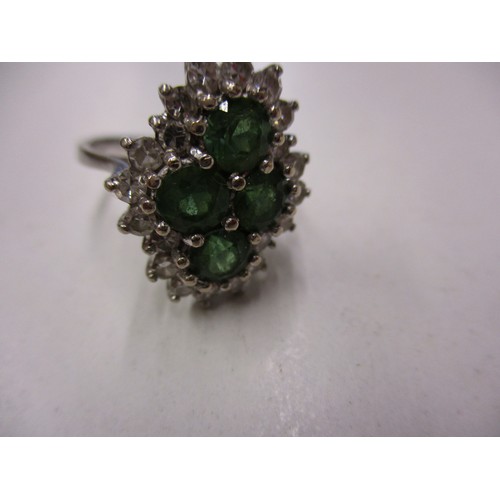 13 - An 18ct white gold diamond and green gem set Cocktail ring, approx. ring size ‘L1/2’