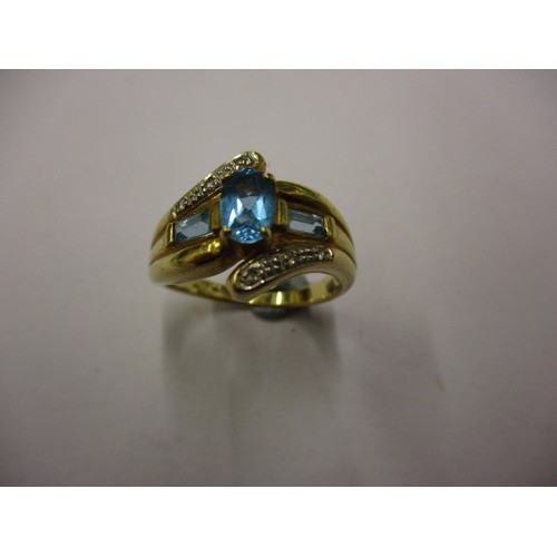 1 - An 18ct yellow gold ring set with small diamonds and 3 turquoise blue stones, approx. weight 5.7g, a... 