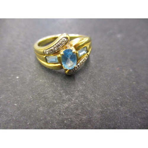 1 - An 18ct yellow gold ring set with small diamonds and 3 turquoise blue stones, approx. weight 5.7g, a... 