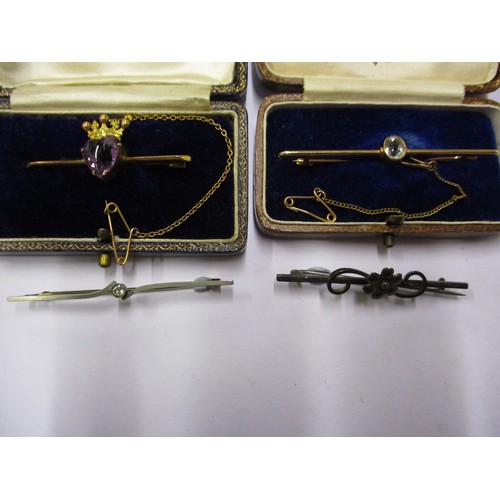 52 - 4 Vintage bar brooches, one 15ct gold one 9ct gold and one marked for silver, the other is unmarked