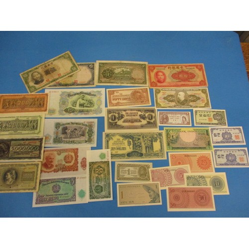 A collection of vintage world bank notes