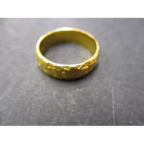 33 - A 22ct gold wedding band, approx. weight 6.1g, approx. ring size ‘O’