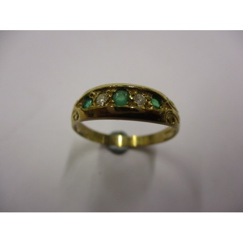3 - A 9ct gold ring set with emeralds and diamonds. Approximate weight 1.9g, approximate ring size P