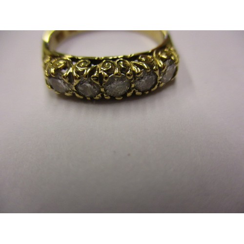 8 - An 18ct gold ring set with 5 diamonds. Approximate weight 3.6g, approximate ring size N