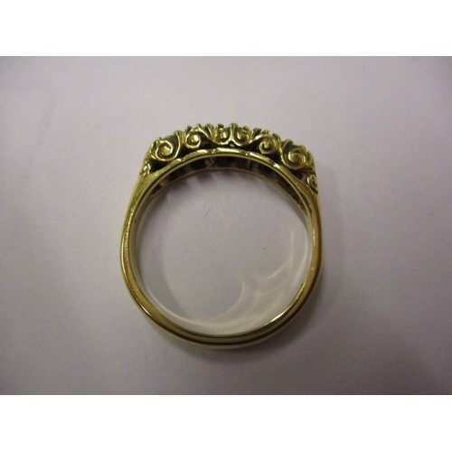 8 - An 18ct gold ring set with 5 diamonds. Approximate weight 3.6g, approximate ring size N