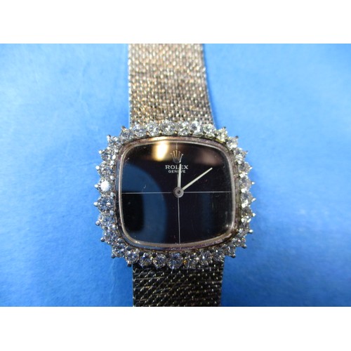 87 - A 1970’s ladies mechanical Rolex wristwatch with diamond set bezel and integral 18ct white gold stra... 