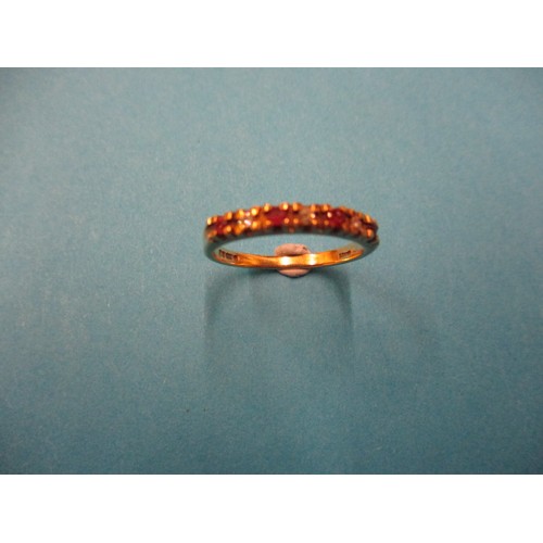 9 - A 9ct yellow gold diamond and ruby ring, approx. ring size ‘L’ approx. weight 1.6g, having 3 diamond... 