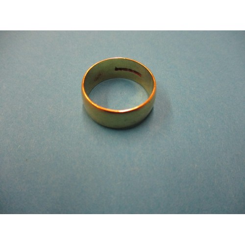 29 - An 18ct yellow gold wedding band, approx. weight 7.1g approx. ring size ‘P1/2’ approx. width 7.8mm