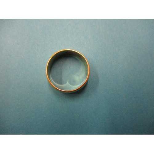 29 - An 18ct yellow gold wedding band, approx. weight 7.1g approx. ring size ‘P1/2’ approx. width 7.8mm