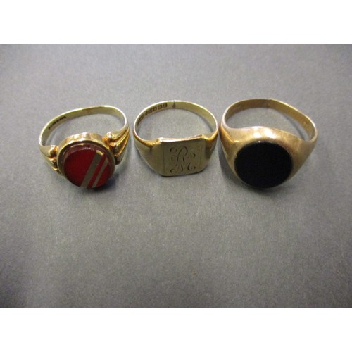 39 - 3 vintage 9ct gold signet rings, approx. combined weight 14.3g, one being cut on base of shank, in p... 