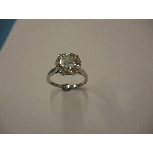 25 - A very large vintage diamond solitaire ring with platinum shank, the stone being approx. 3.12cts. Th... 