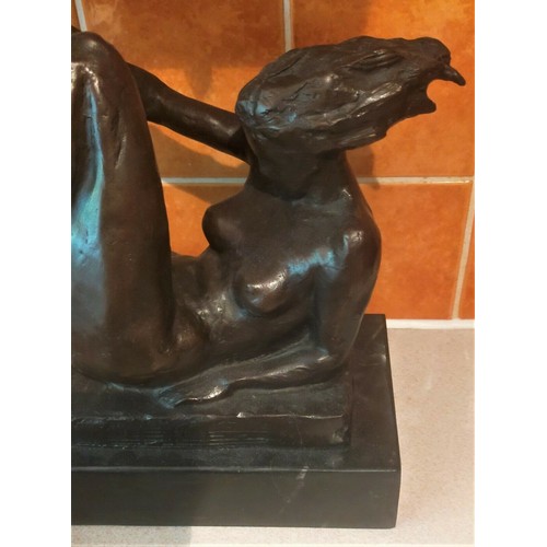 663 - Solid Bronze Statue of Naked Lady Laying On a Rock, Made of Marble, With Her Legs Bent and Raised
