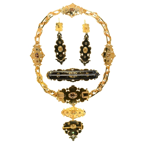 27 - AN EMERALD, PEARL AND GOLD DEMI PARURE, C1840 pierced and crisply chased with scrolling foliage, com... 